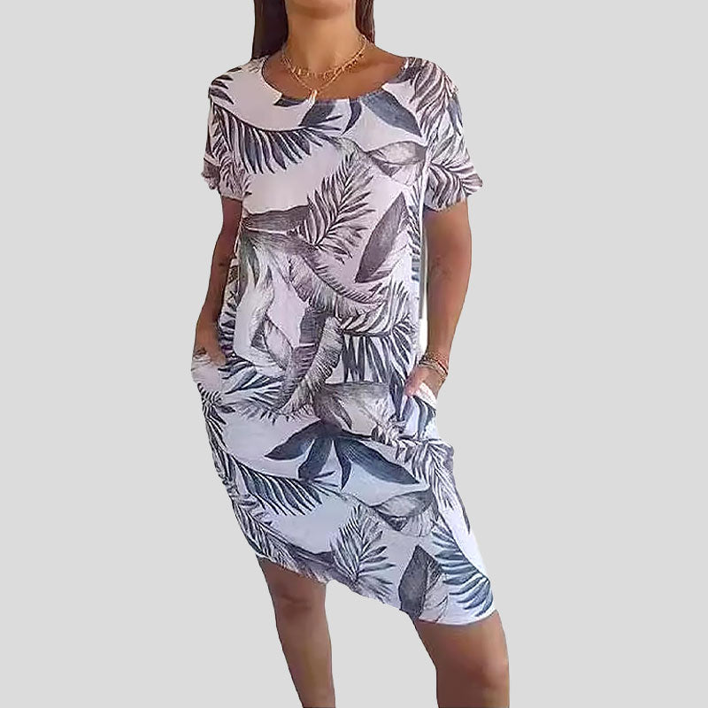 🌼Blomstret kjole med lommer i mercerisert bomull